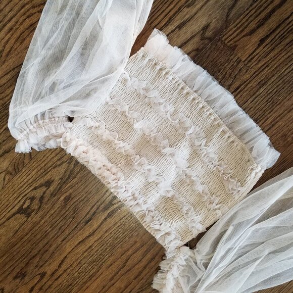 Chic Cream Crop Top with Elegant Design - Picture 3 of 10